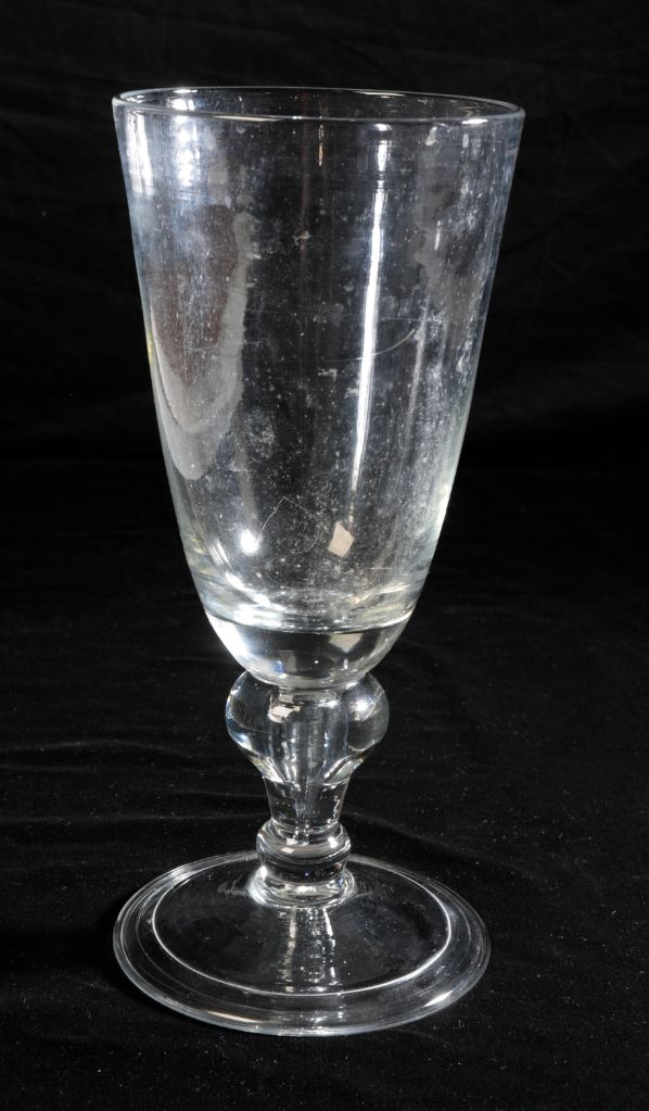 AN EARLY 18TH CENTURY BALUSTER WINE GOBLET