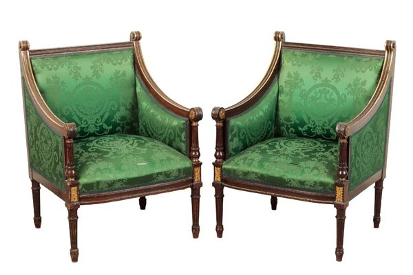 A PAIR OF REGENCY MAHOGANY AND PARCEL GILT ARMCHAIRS