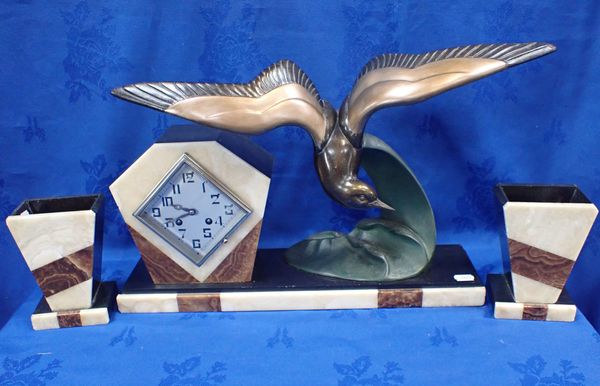 AN ART DECO CLOCK GARNITURE WITH BRONZED SPELTER SEAGULL AFTER IRENE ROCHARD