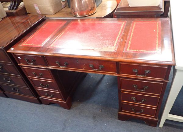 A REPRODUCTION MAHOGANY PEDESTAL DESK