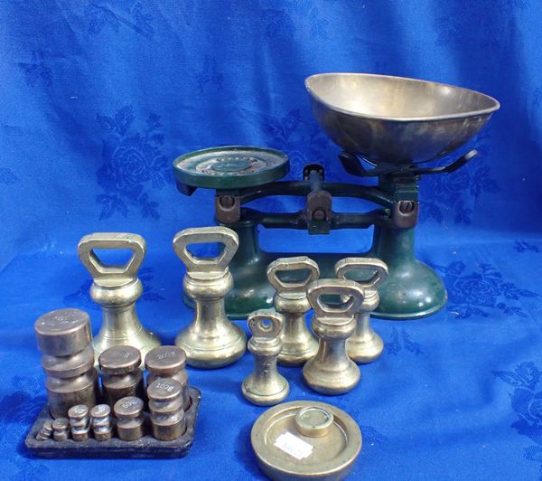 A SET OF VICTOR ENGLAND SCALES WITH WEIGHTS