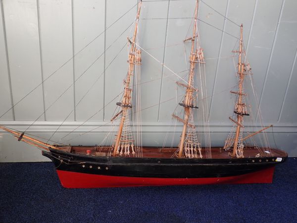 A SCRATCH-BUILT WOODEN MODEL SAILING SHIP