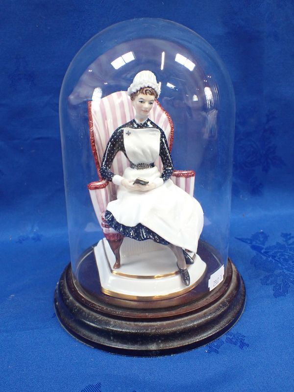 A ROYAL WORCESTER FIGURINE: 'SISTER NIGHTINGALE TRAINING SCHOOL ST THOMAS' HOSPITAL'