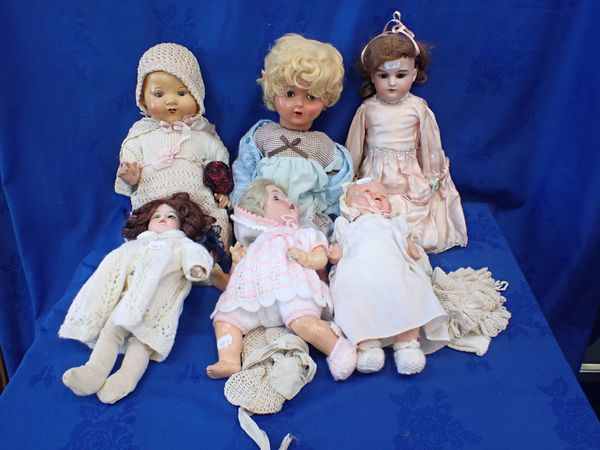 A COLLECTION OF BISCQUE DOLLS AND OTHER SIMILAR