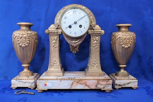 AN EARLY 20TH CENTURY FRENCH CLOCK GARNITURE