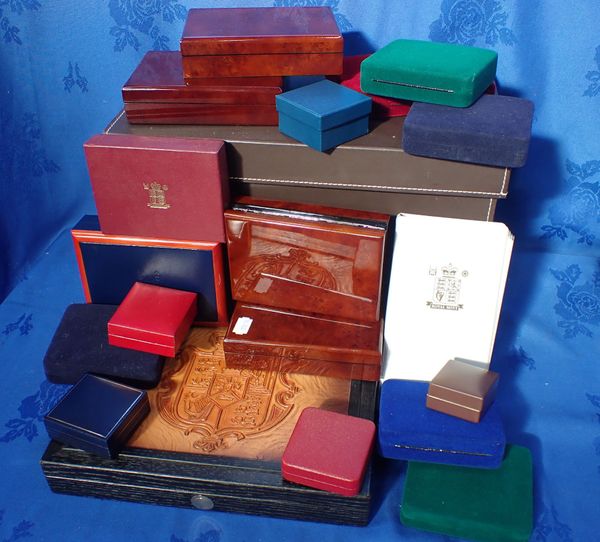 A COLLECTION OF EMPTY COIN PRESENTATION BOXES