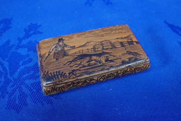 A 19TH CENTURY PENWORK SNUFFBOX SHOWING A HARE HUNTING SCENE