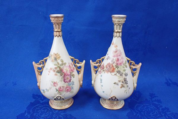 A PAIR OF ROYAL WORCESTER BLUSH IVORY VASES