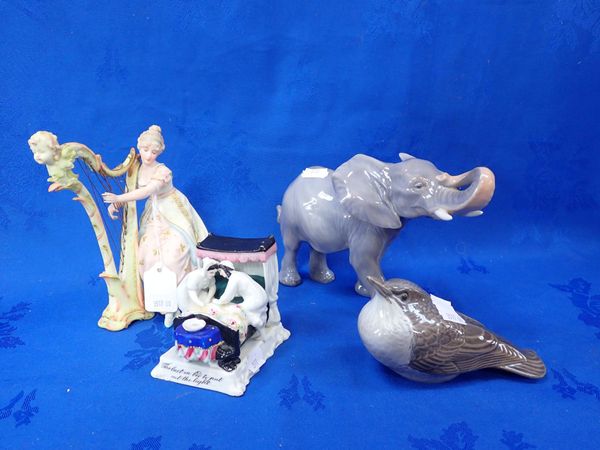 A ROYAL COPENHAGEN ELEPHANT AND A BIRD