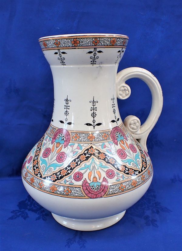 A WASHSTAND JUG AFTER A DESIGN ATTRIBUTED TO DR. CHRISTOPHER DRESSER