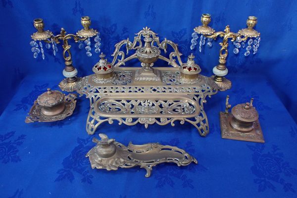 A CAST BRASS VICTORIAN STYLE DESK STAND