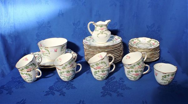 A ROYAL CROWN DERBY PINK ROSES AND GREEN VINE PART TEA SERVICE