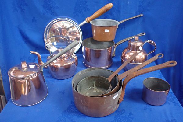 A COLLECTION OF 19TH CENTURY AND LATER COPPER SAUCEPANS