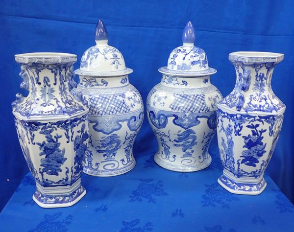 A PAIR OF MODERN BLUE AND WHITE CHINESE VASES AND COVERS