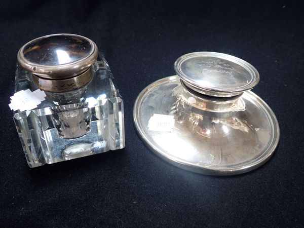 A SILVER CAPSTAN SHAPED INKWELL WITH 1942 HOME GUARD INSCRIPTION