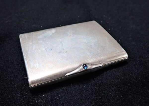 A RUSSIAN SILVER CIGARETTE CASE, WITH JEWELLED DETAIL