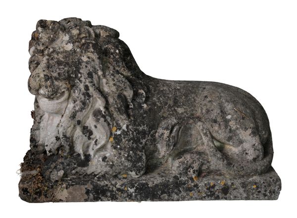 A PAIR OF COMPOSITION STONE LIONS