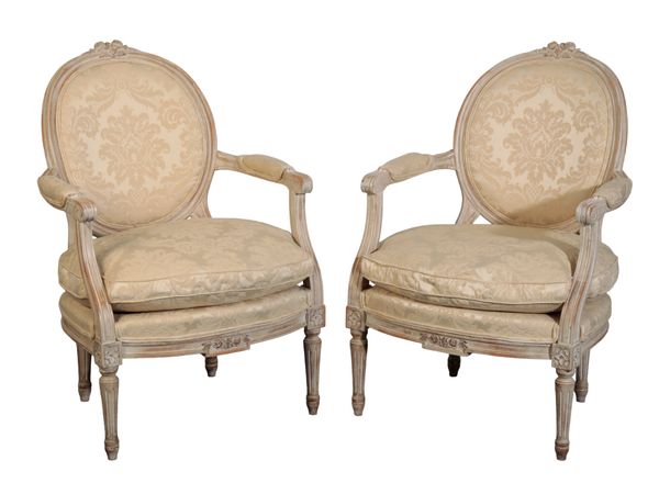 A PAIR OF LOUIS XVI STYLE GREY-PAINTED FAUTEUILS