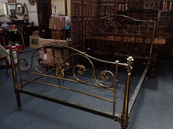 A VICTORIAN BRASS BED, CAST WITH  SCROLLING LEAVES