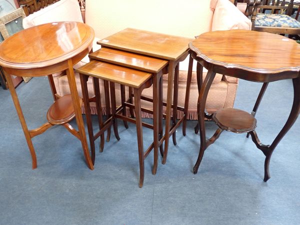 AN EDWARDIAN MAHOGANY NEST OF THREE TABLES