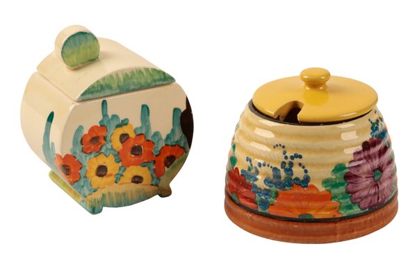 CLARICE CLIFF FOR WILKINSON LTD: A 'BONJOUR' MODEL JAM POT DECORATED IN THE 'SANDON' PATTERN