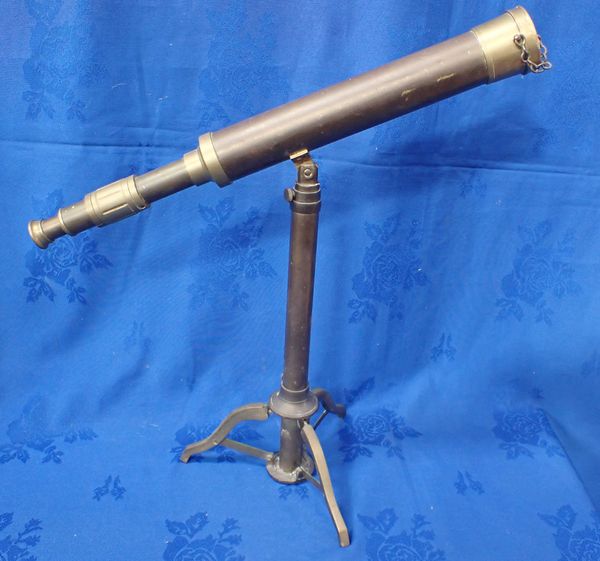 A REPRODUCTION BRASS TELESCOPE