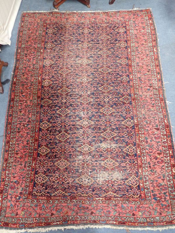 A NORTH-WEST PERSIAN BIDJAR RUG, HERATI  FIELD