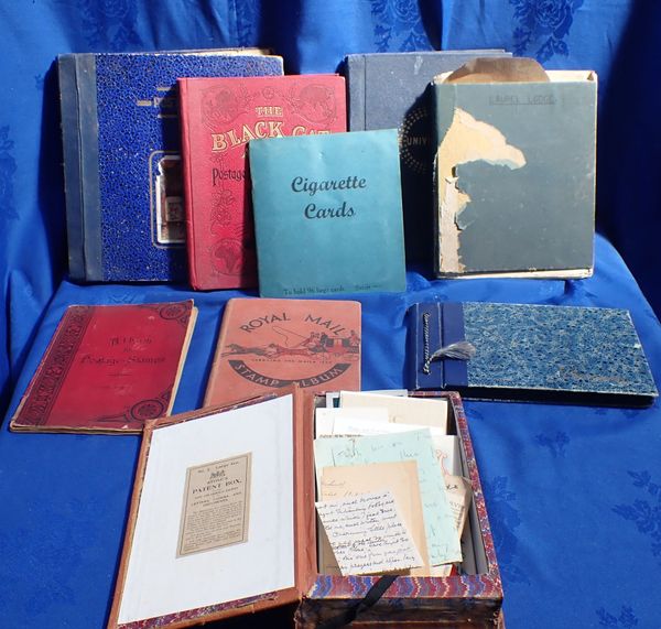 A COLLECTION OF STAMP ALBUMS