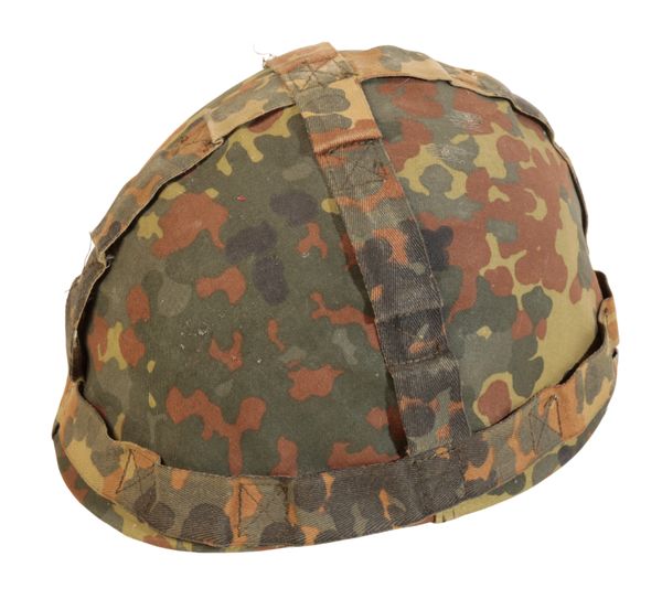A CONTINENTAL CAMOUFLAGE ARMY HELMET