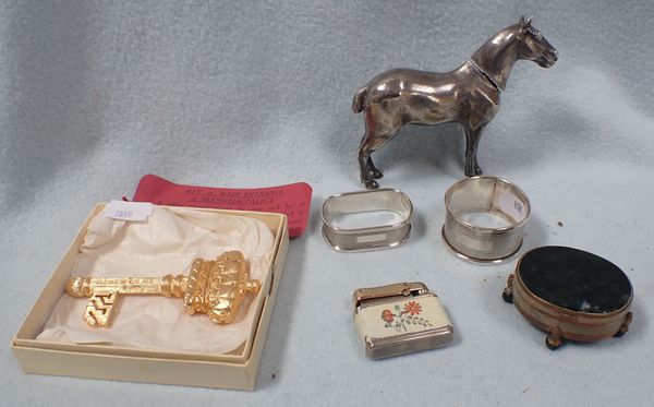 A WHITE METAL NOVELTY HORSE TABLE LIGHTER (?)