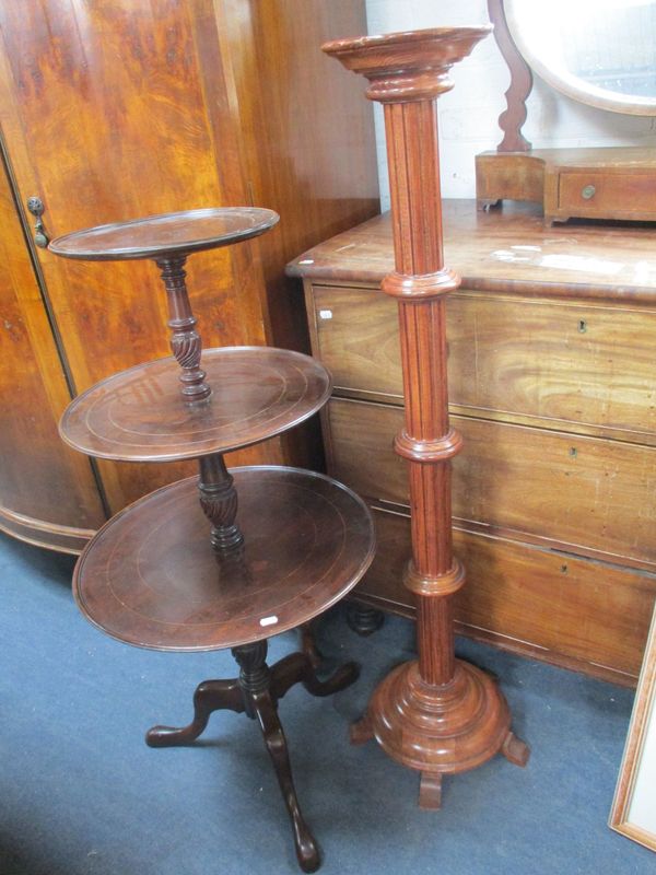 A GEORGE III STYLE MAHOGANY THREE-TIER DUMB WAITER