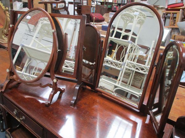 AN ARCHED-TOP MAHOGANY FRAMED DRESSING MIRROR