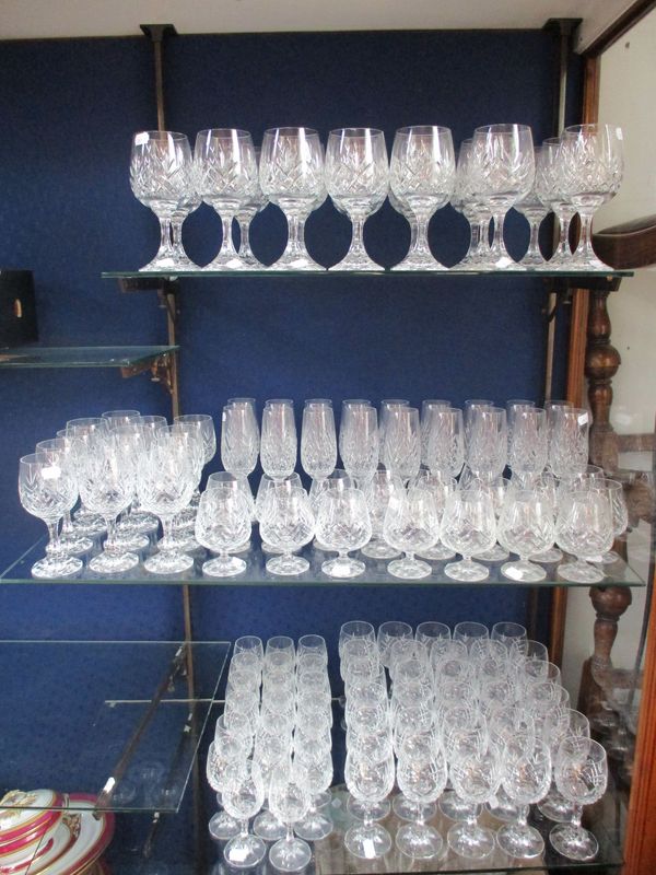 AN EXTENSIVE SUITE OF TABLE GLASS