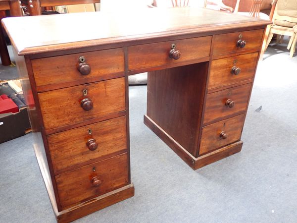 A VICTORIAN MAHOGANY DESK, OF SMALL PROPORTIONS