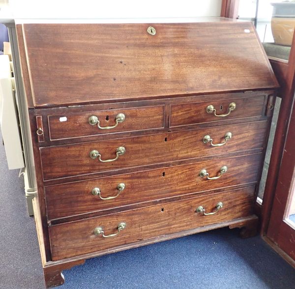 A GEORGE III MAHOGANY BUREAU WITH ORIGINAL BRASS SWAN NECK HANDLES