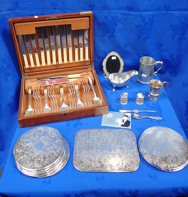 A COLLECTION OF SILVER PLATED TABLE MATS