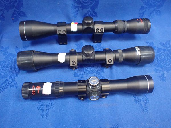 THREE RIFLE SCOPES WITH RIFLE MOUNTS