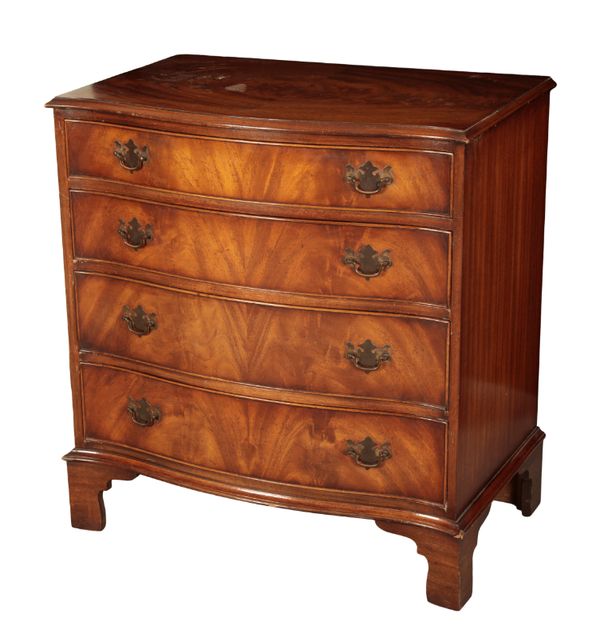 A GEORGE III STYLE MAHOGANY SERPENTINE CHEST OF DRAWERS