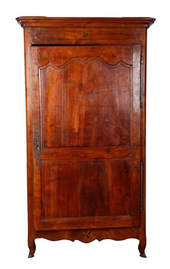 A FRENCH PROVINCIAL CHESTNUT ARMOIRE