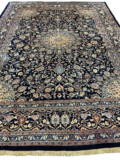 A NORTH EAST PERSIAN MESHED CARPET