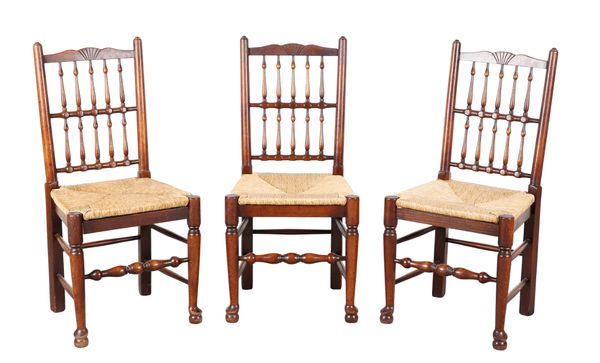 A SET OF EIGHT ELM SPINDLEBACK DINING CHAIRS