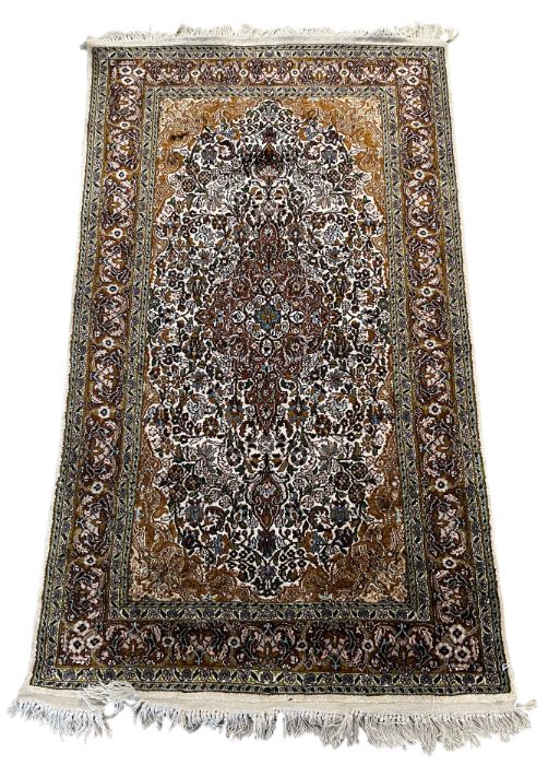 A NORTH WEST PERSIAN SILK RUG