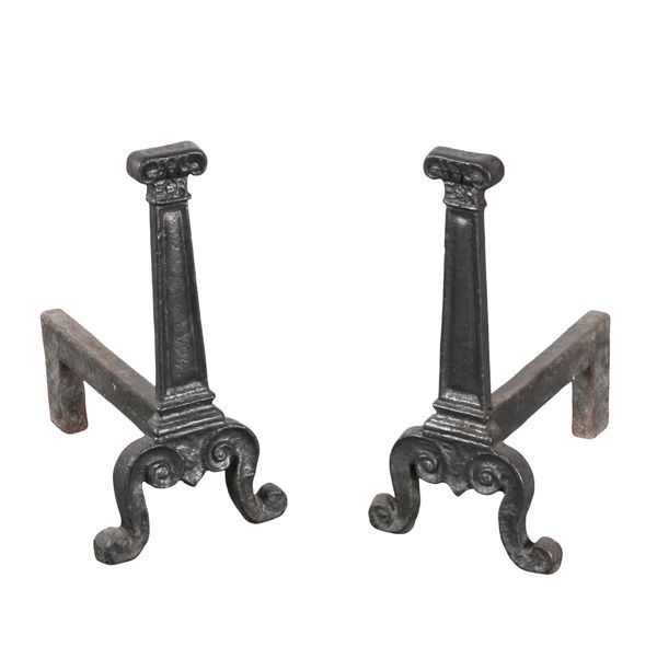 A PAIR OF CAST-IRON FIRE DOGS