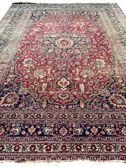 A LARGE ISFAHAN STYLE CARPET