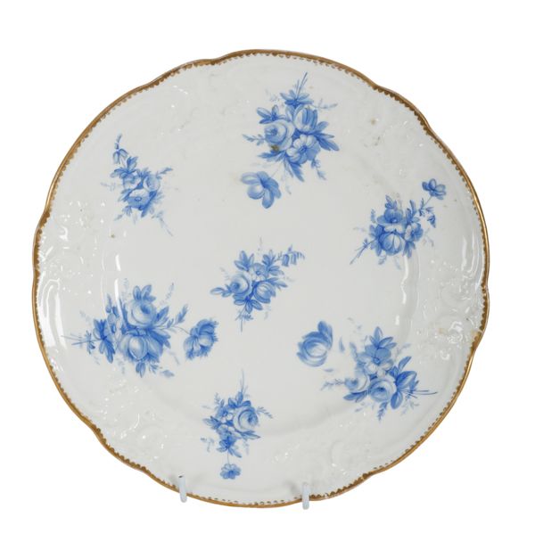 A NANTGARW MOULDED BLUE AND WHITE PLATE