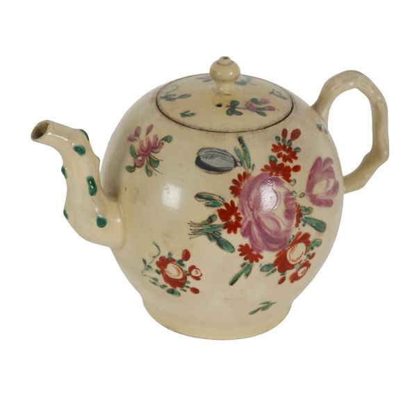 A CREAMWARE TEAPOT AND COVER