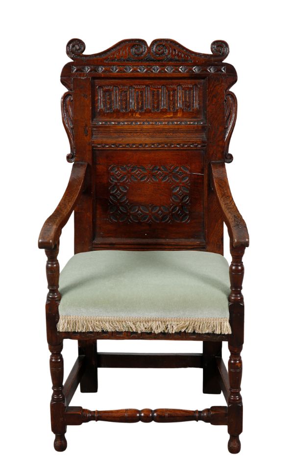 A 17TH CENTURY OAK WAINSCOT CHAIR