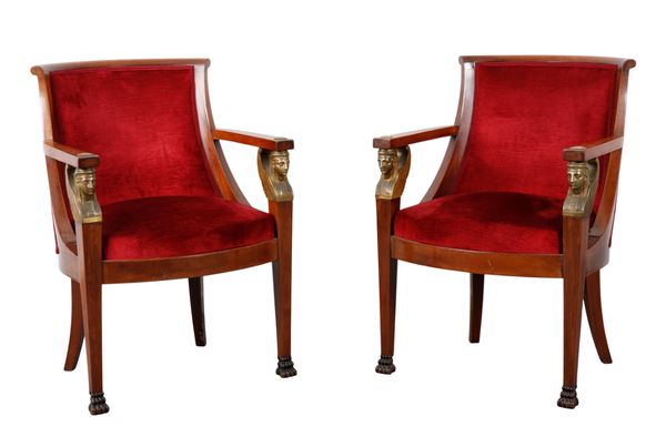 A PAIR OF EMPIRE STYLE MAHOGANY AND GILT METAL MOUNTED ARMCHAIRS