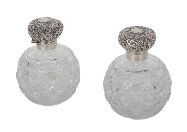 TWO SILVER MOUNTED AND CUT GLASS SCENT BOTTLES