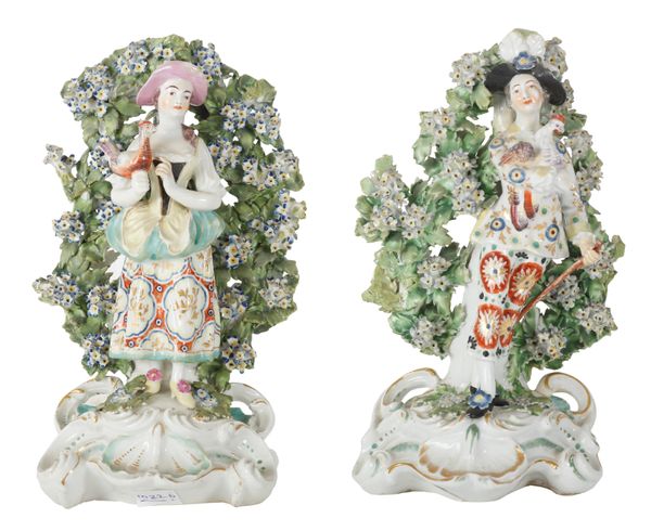 A PAIR OF DERBY PORCELAIN FIGURES OF THE ITALIAN FARMER AND HIS WIFE
